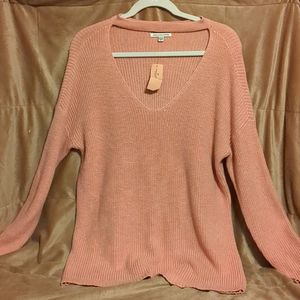 American eagle pink sweater with neck cut out size medium